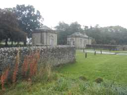 Oblique view of wall connected to West Lodge at Streathlam Castle October 2016